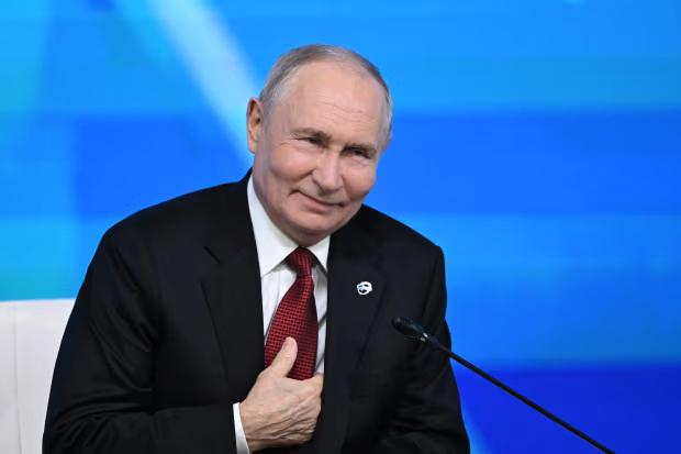 ولادیمیر پوتین، رئیس‌جمهور روسیه، عکس از Igor Ivanko/AFP/Getty Images