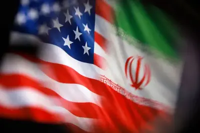 usa iran flags